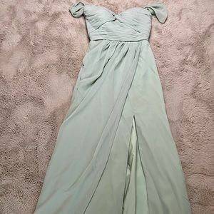 Mint green off-the-shoulder bridesmaids dress.